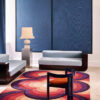 Tapis Flower Power Fushia Toulemonde Bochart en vente chez Mise en Scène – ambiance seventies colorée.