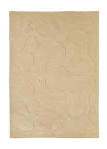 tapis Rooted en laine ivoire ou terracotta avec motif organique en relief